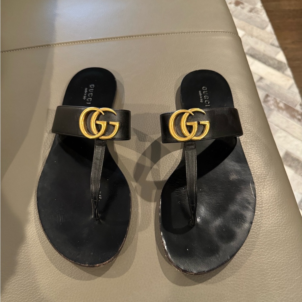 Gucci Black Leather Sandals with Gold Emblem